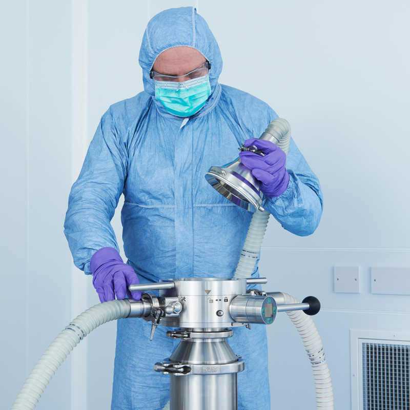 a technician opening an aseptic split butterfly valve